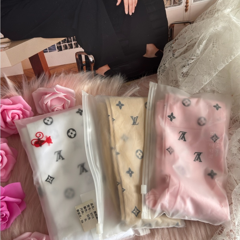 patterned LV logo tights semi sheer